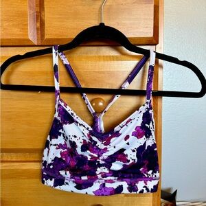 Purple and white sports bra
